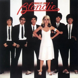 Debbie Harry in a white dress with hands on hips, flanked by men in suits, on Blondie's Parallel Lines album cover.