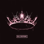 Pink ornate crown design on a dark background, with the Blackpink logo beneath it.