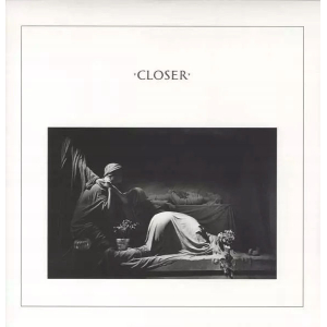 Monochrome artwork showing a figure lying on a bed with another person seated nearby and flowers nearby.