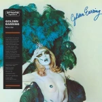 Golden Earring Moontan album cover with a pale topless model among teal feathers and a black vertical information panel on the left.