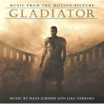 Gladiator movie poster: warrior in armor with a sword stands in a smoky arena, arches in the background; text at top reads 'Music from the Motion Picture Gladiator' and bottom credits musicians.
