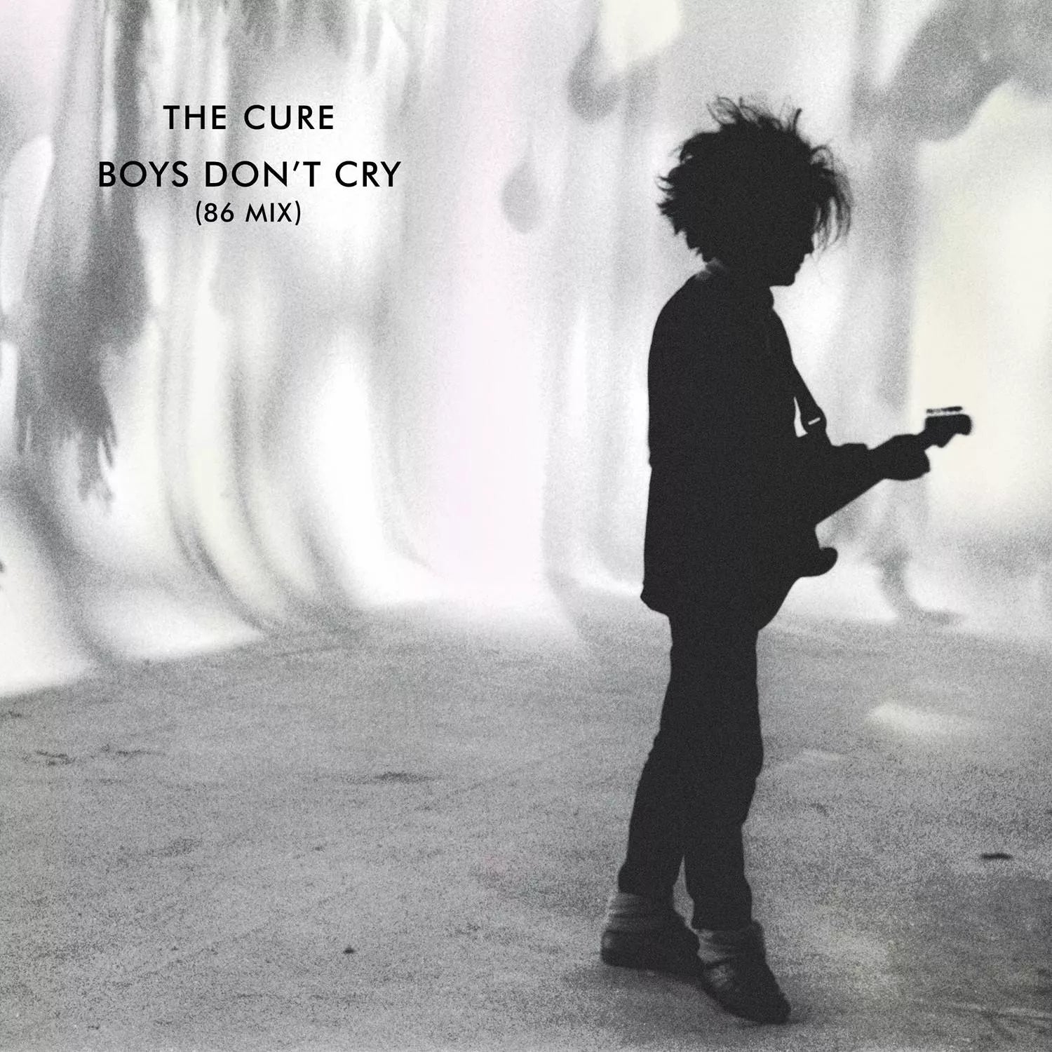 0199957322386 - ELPÉČKO.sk Black-and-white poster-style image: a silhouetted child guitarist on the right, with 'THE CURE BOYS DON'T CRY (86 MIX)' text on the left.