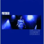 Portishead album cover with a blue-toned scene and a person in a chair, title 'DUMMY' visible at right.