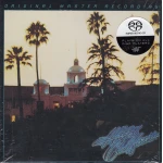 Hotel California album cover: sunset with palm trees and a building with domes; 'Original Master Recording' along the top.