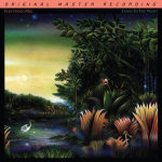 Album cover art: tropical jungle scene with sunset over a river, colorful foreground plants, and a white heron by the water
