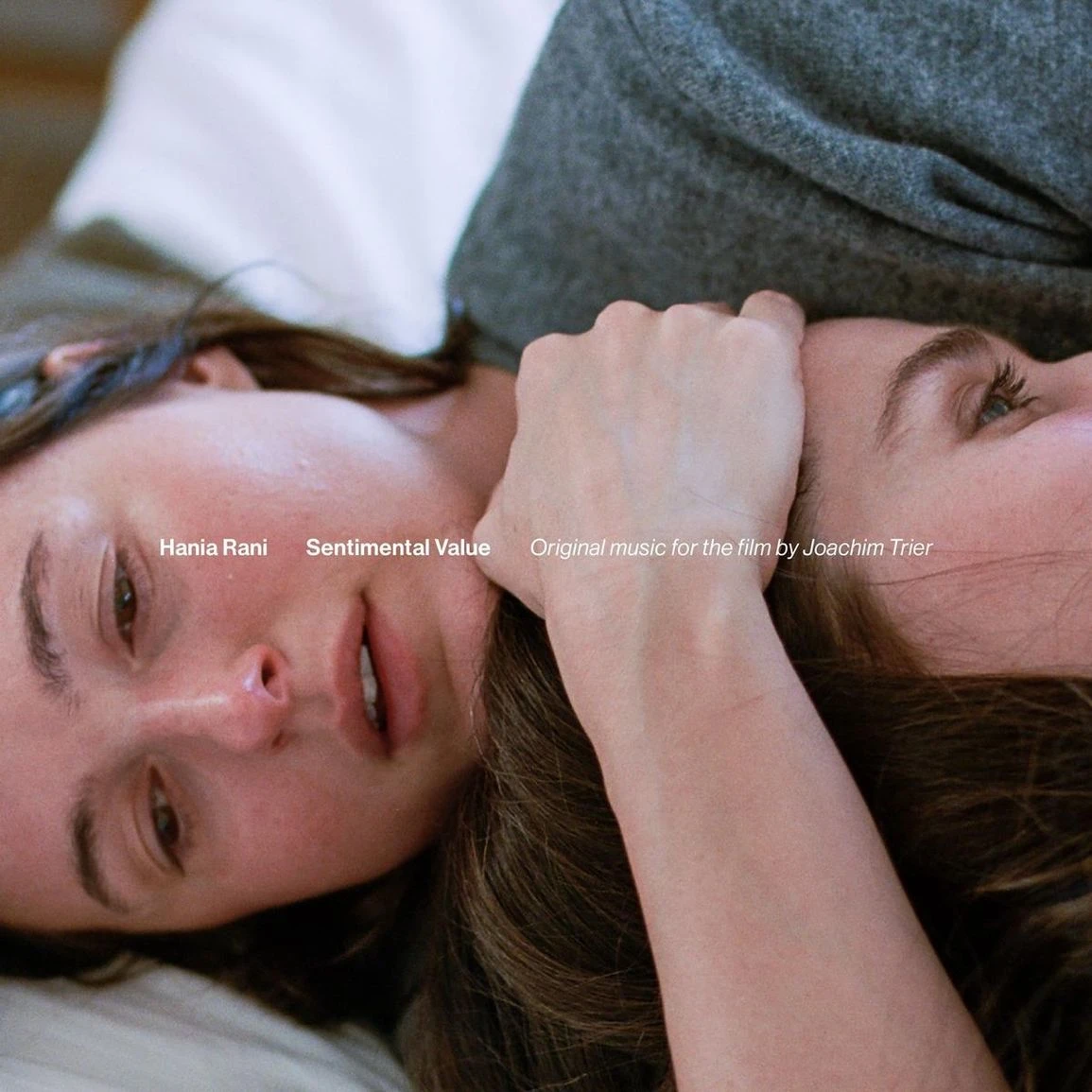 4062548134612 - ELPÉČKO.sk Album cover: two people lying close together, one hand near a face, with the text 'Hania Rani Sentimental Value' across.