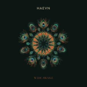 Album cover featuring a vibrant, circular peacock feather mandala in teal and orange on a black background, with 'HAEVN' at the top and 'WIDE AWAKE' at the bottom.